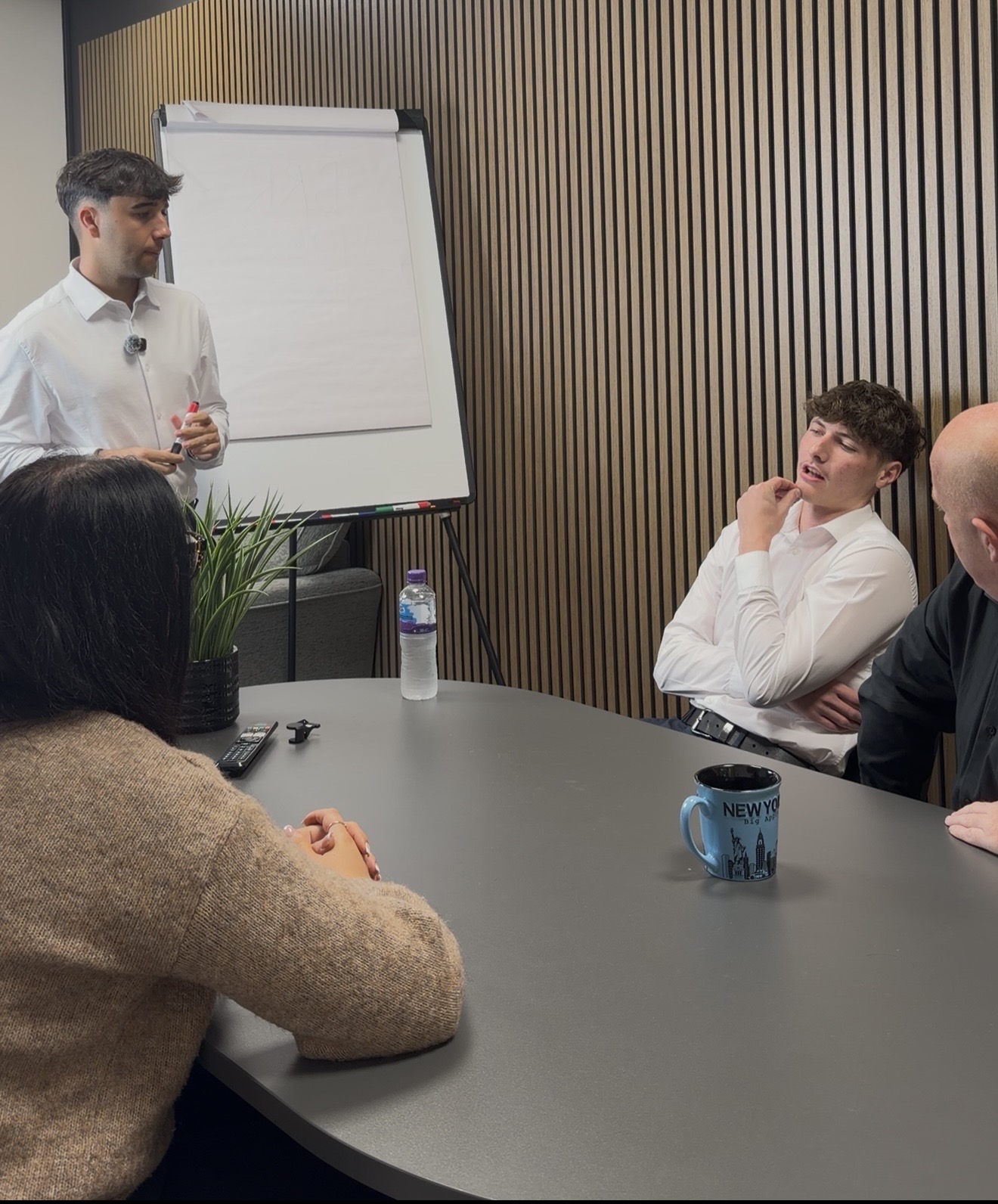 Joe running a property investment strategy session at a whiteboard