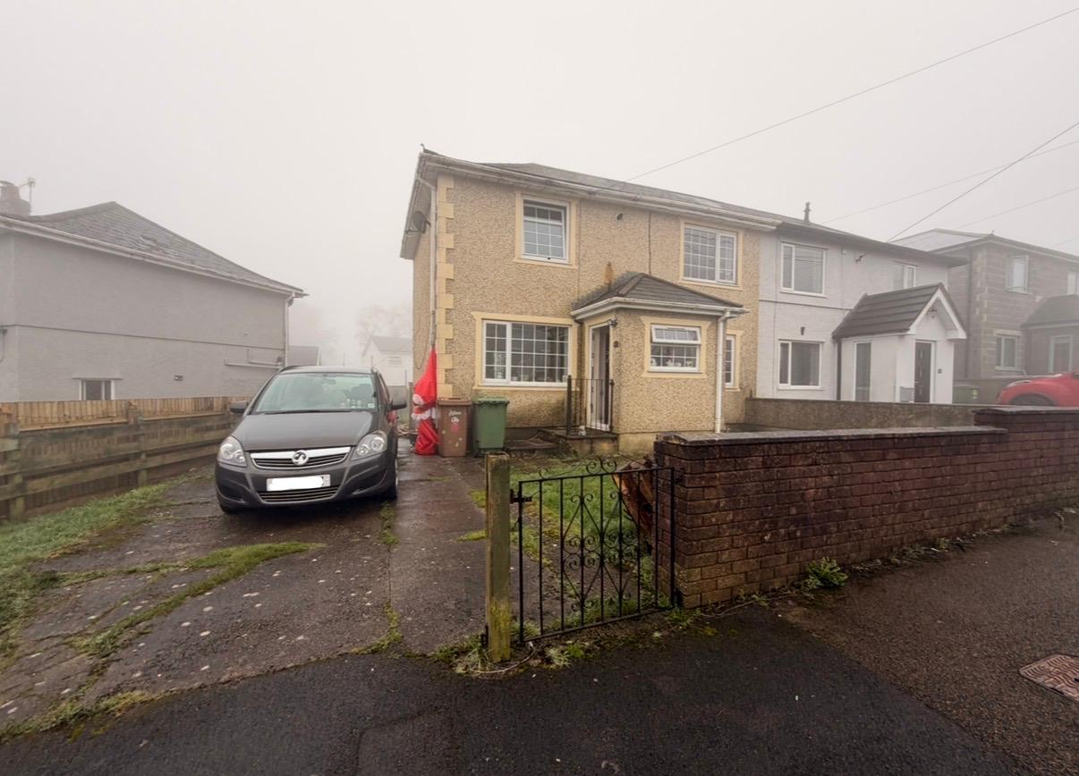 Front and driveway of the property before external works